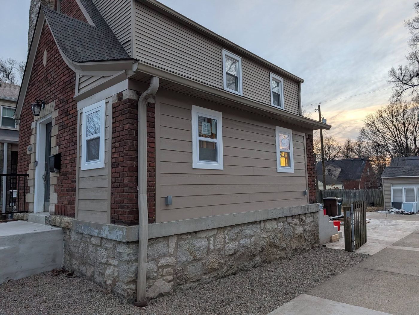 Bathroom addition exterior with new siding